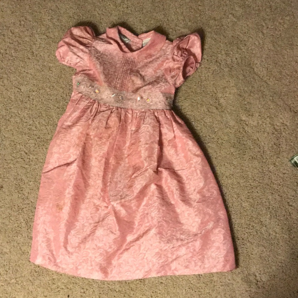 Girly, poofy pink princess dress.